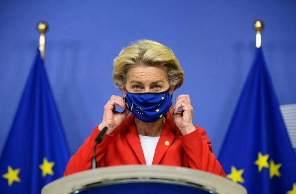 Von der Leyen adjusts her protective mask before delivering a statement before the second face-to-face EU summit since the Covid outbreak in Brussels in October 2020