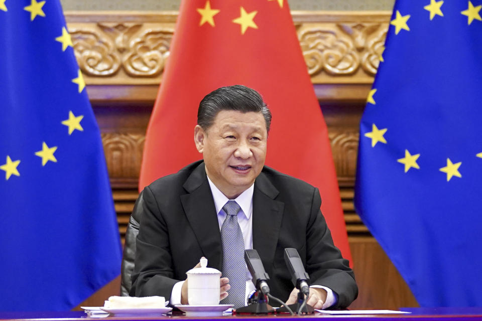 FILE - In this photo released by Xinhua News Agency, Chinese President Xi Jinping speaks during a video conference with European leaders from Beijing on Dec. 30, 2020. The European Union will seek China's assurances that it won't assist Russia in circumventing economic sanctions leveled over the invasion of Ukraine at an annual summit Friday, April 1, 2022. (Li Xueren/Xinhua via AP, File)