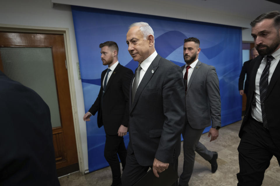 Israeli Prime Minister Benjamin Netanyahu arrives to the weekly cabinet meeting in Jerusalem, Sunday, Feb. 12, 2023. (AP Photo/Ohad Zwigenberg, Pool)