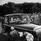 <p>Queen Elizabeth II <a href="https://www.townandcountrymag.com/society/tradition/news/a8148/queen-elizabeth-car-auction/" rel="nofollow noopener" target="_blank" data-ylk="slk:takes a ride;elm:context_link;itc:0;sec:content-canvas" class="link ">takes a ride</a> with Prince Charles and Princess Anne as passengers.</p>