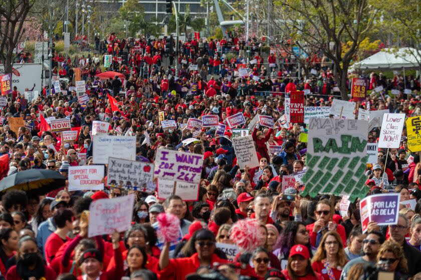 Los Angeles, CA - March 15: A crowd gathered in Grand Park infant of City Hall on Wednesday, March 15, 2023, in Los Angeles, CA. United Teachers of Los Angeles and SEIU 99 members hold a joint rally at Grand Park in a historic show of solidarity. It has been almost ten months since the contract between LAUSD and UTLA has expired, and a staggering three years for SEIU members, leaving almost 60,000 employees vulnerable in the midst of a record-high inflation and a housing crisis. (Francine Orr / Los Angeles Times)