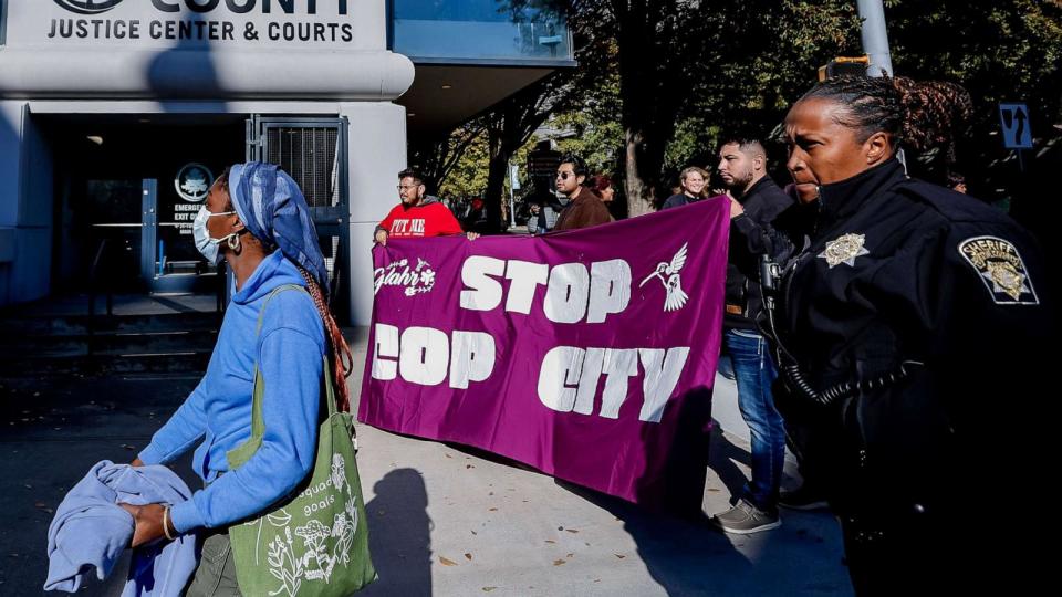 PHOTO: “Stop Cop City” protesters demonstrate outside the Fulton County Courthouse as 61 other protesters are arraigned on state RICO (Racketeer Influenced and Corrupt Organizations) charges in Atlanta, November 6 2023. (Erik S. Lesser/EPA via Shutterstock)