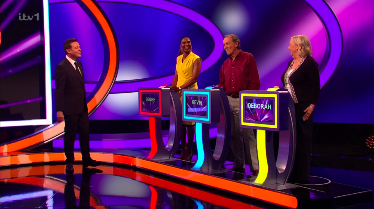 Stephen Mulhern pictured with players Denise Lewis, Kevin Whately and Meaden on the iconic gameshow. (ITV screenshot)