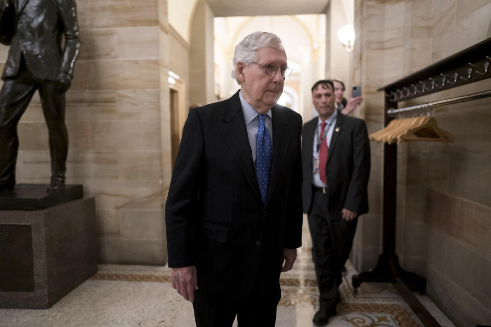 Senate Minority Leader Mitch McConnell, R-Ky., arrives as Senate Republicans gather in the historic Old Senate Chamber for debate as they choose their leadership, at the Capitol in Washington, Wednesday, Nov. 16, 2022. Sen. Rick Scott, R-Fla., an ally of former President Donald Trump, is challenging longtime GOP leader Sen. Mitch McConnell, R-Ky. (AP Photo/J. Scott Applewhite)