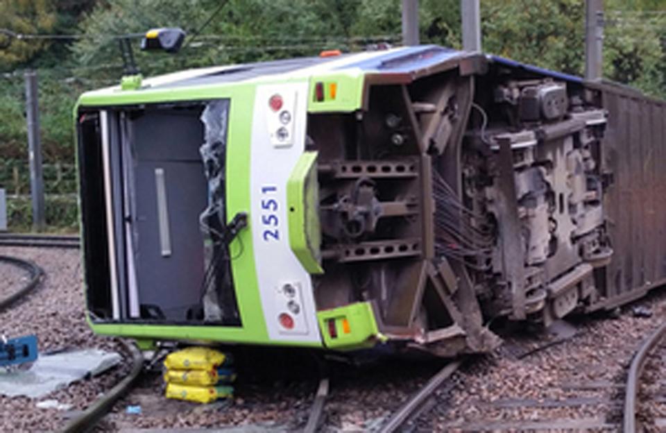 <p>A file photo issued by the Rail Accident Investigation Branch of the derailed tram</p> (PA)