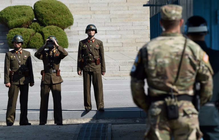 Unlike the rest of the frontier, Panmunjom is not fortified with minefields and barbed wire, but soldiers from both sides face off across the dividing line