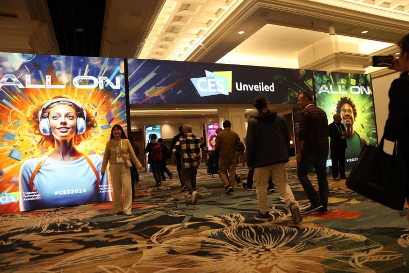 Attendees enter "CES Unveiled" during Media Days at the 2024 International CES at the Mandalay Bay Convention Center in Las Vegas on Sunday. Photo by James Atoa/UPI