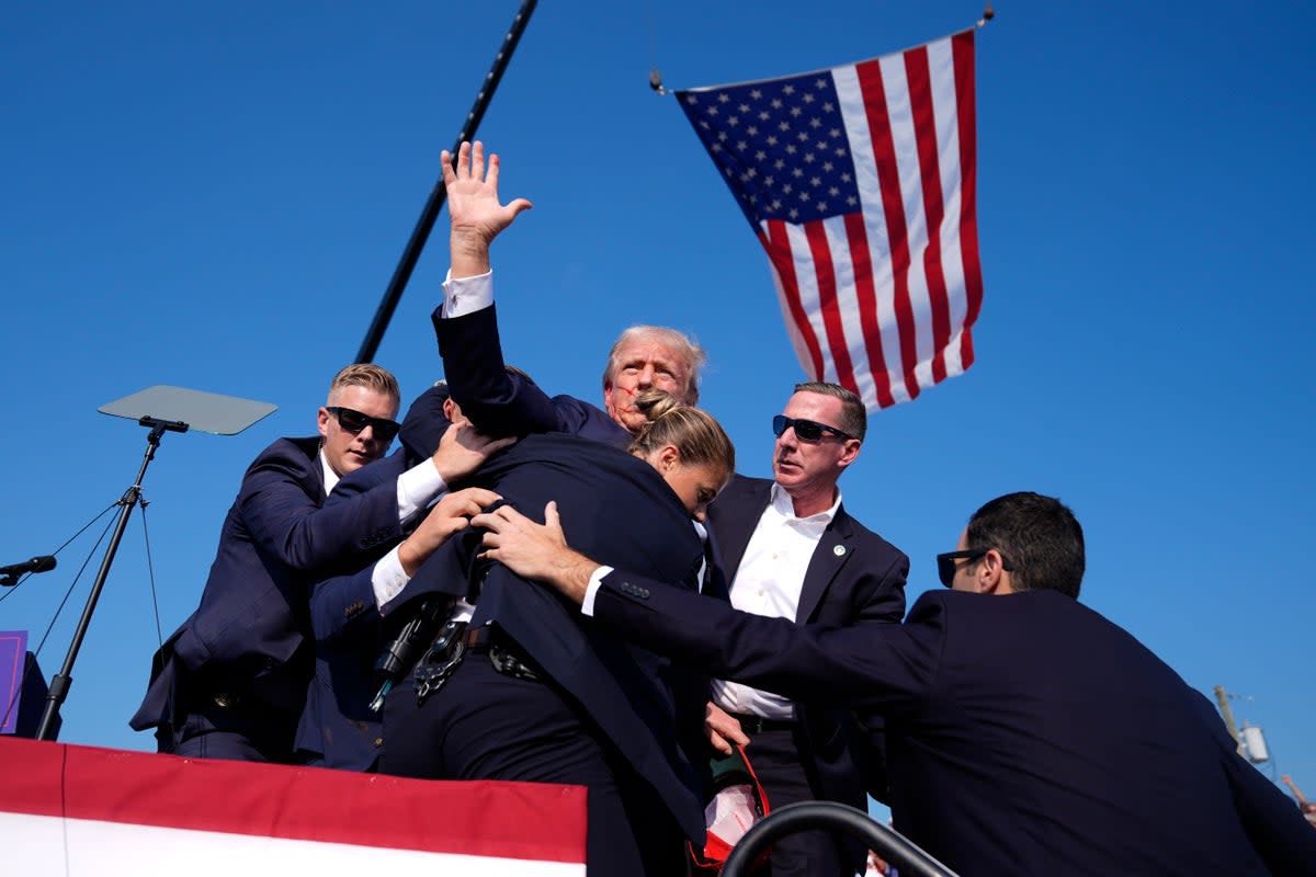 Details from a Secret Service investigation show communication breakdowns in the moments before former president Donald Trump was shot during a rally in Bulter, Pennsylvania. (AP)