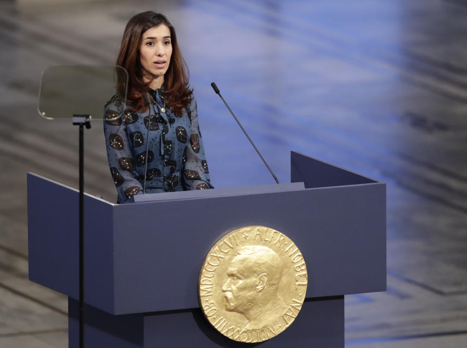 The Peace Prize laureates Nadia Murad from Iraq, makes a speech during the Nobel Peace Prize Ceremony in Oslo Town Hall, Oslo, Monday Dec. 10, 2018. Dr. Denis Mukwege of Congo and Nadia Murad of Iraq jointly receive the Nobel Peace Prize recognising their efforts to end the use of sexual violence as a weapon of war and armed conflict. (Haakon Mosvold Larsen / NTB scanpix via AP, Pool)