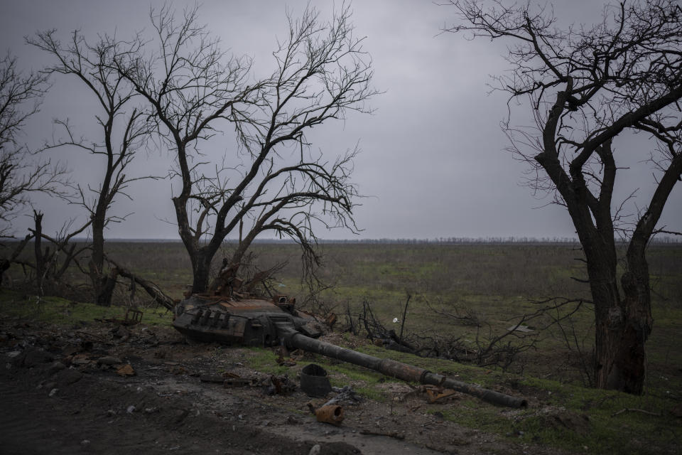 The turret of a destroyed tank is pictured outside Kalynivske, Ukraine, Saturday, Jan. 28, 2023. (AP Photo/Daniel Cole)