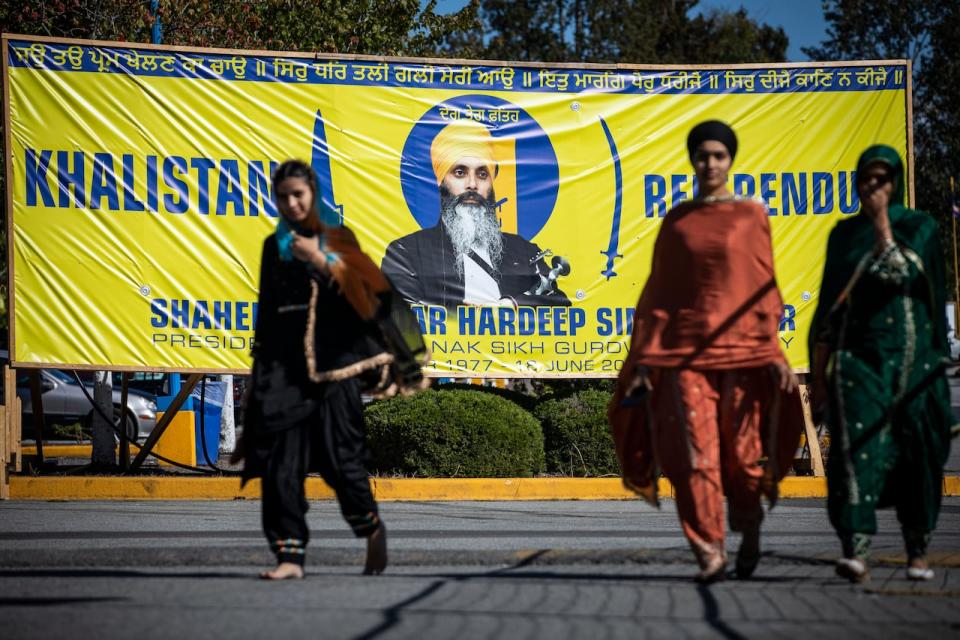 Members of the Sikh community are pictured at the Guru Nanak Sikh Gurdwara where Hardeep Singh Nijjar was fatally shot in Surrey B.C, on Monday, September 18, 2023.