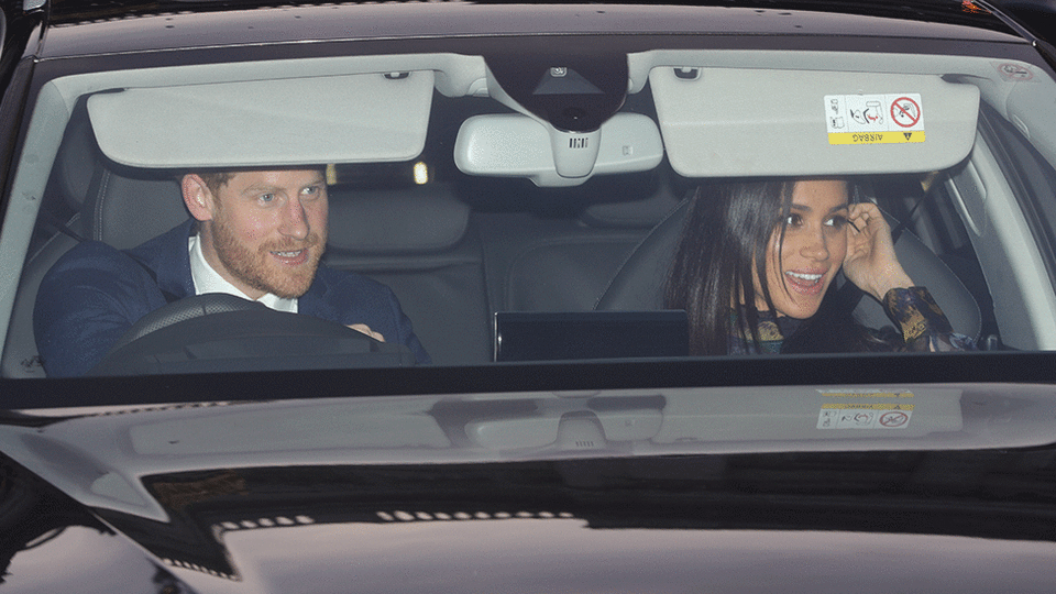 The Duchess of Sussex was photographed in the passenger seat as husband Harry drove through the palace gates. Meghan appeared to be wearing a high-neck ruffled dress by Erdem and her Cartier diamond and white gold earrings. Photo: Getty Images