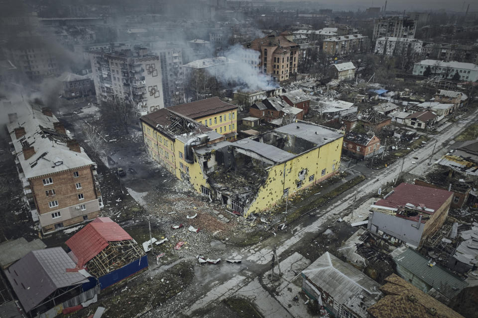 FILE - An aerial view of Bakhmut, the site of heavy battles with Russian troops in the Donetsk region, Ukraine, Sunday, March 26, 2023. Ukrainian President Volodymyr Zelenskyy said Sunday, May 21, 2023 that Russian forces weren't occupying Bakhmut, casting doubt on Moscow's insistence that the eastern Ukrainian city had fallen. The fog of war made it impossible to confirm the situation on the ground in the invasion’s longest battle, and the comments from Ukrainian and Russian officials added confusion to the matter. (AP Photo/Libkos, File)