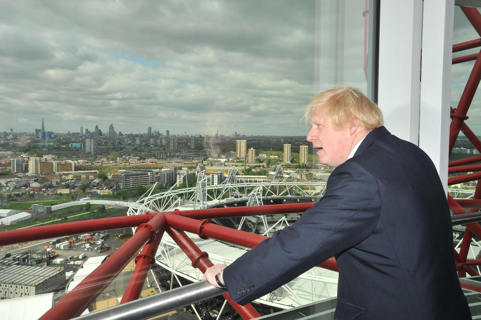 London Mayor Boris Johnson looks out from the public viewing platform of the newly completed ArcelorMittal Orbit, the Anish Kapoor and Cecil Balmond-designed sculpture that that will stand at the heart of the London 2012 Olympic and Paralympic Park.