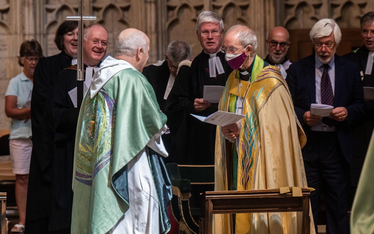 The Archbishops and York and Canterbury attend The Synod Eucharist Commission on Sunday. The Church of England has come in for criticism after Dr Robert Innes, the Bishop in Europe, said 'there is no official definition' of a woman - Charlotte Graham