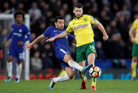 Soccer Football - FA Cup Third Round Replay - Chelsea vs Norwich City - Stamford Bridge, London, Britain - January 17, 2018 Chelsea's Pedro fouls Norwich City's Wesley Hoolahan resulting in him receiving his second yellow card and being sent off REUTERS/David Klein