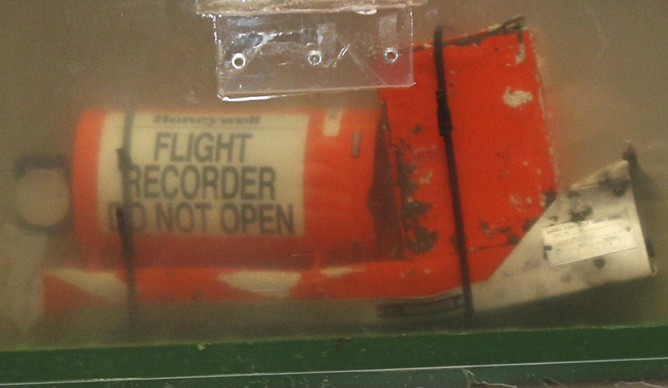 FILE - This May 12, 2011 file photo shows one of the two flight recorders of the Air France flight 447, which crashed in 2009, in Le Bourget, near Paris. Geoff Dell, discipline leader of accident investigation at Central Queensland University, said if the black boxes of a missing Malaysia Airlines Flight MH370 were several kilometers (miles) deep, ships might need to be almost directly over them before the signal could detect them. If found in deep water, Dell expected that unmanned submarines would be needed to retrieve them. That’s how the black box from Air France Flight 447 was retrieved in May 2011, almost two years after the Airbus A330 crashed with the loss of 228 lives. (AP Photo/Michel Euler, File)