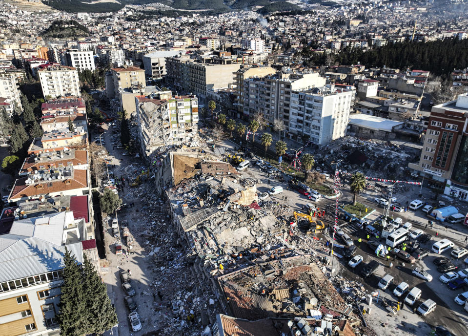 Aerial photo shows the destruction in Kahramanmaras, southern Turkey, Wednesday, Feb. 8, 2023. Thinly stretched rescue teams worked through the night in Turkey and Syria, pulling more bodies from the rubble of thousands of buildings toppled by a catastrophic earthquake. The death toll rose Wednesday to more than 9,500, making the quake the deadliest in more than a decade. (Ahmet Akpolat/DIA via AP )