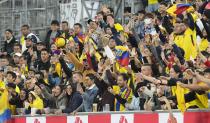 Ecuador supporters celebrate during the international friendly soccer match between Japan and Ecuador as part of the Kirin Challenge Cup in Duesseldorf, Germany, Tuesday, Sept. 27, 2022. (AP Photo/Martin Meissner)