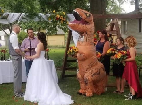 Christina still managed to hold her bouquet, despite the notoriously tiny T-Rex hands. Photo: Facebook