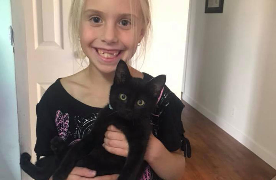 Ariana Groess with her new kitten Midnight. Facebook/ Deanna Groess