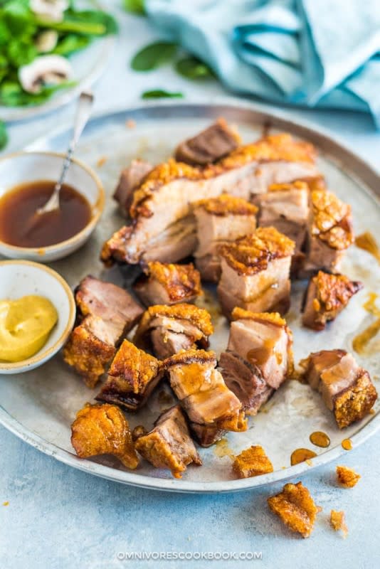 <p>Omnivore's Cookbook</p><p>Try slow-roasting to create melt-in-the-mouth tender and juicy siu yuk with perfect, crispy crackling. It is way easier than you thought!</p><p><strong>Get the recipe: <a href="https://omnivorescookbook.com/siu-yuk/" rel="nofollow noopener" target="_blank" data-ylk="slk:Slow Roasted Crispy Pork Belly;elm:context_link;itc:0;sec:content-canvas" class="link rapid-noclick-resp">Slow Roasted Crispy Pork Belly</a></strong></p><p><strong>Related: <a href="https://parade.com/1178650/marynliles/chinese-names/" rel="nofollow noopener" target="_blank" data-ylk="slk:150 Traditional Chinese Names for Boys and Girls;elm:context_link;itc:0;sec:content-canvas" class="link rapid-noclick-resp">150 Traditional Chinese Names for Boys and Girls</a></strong></p>