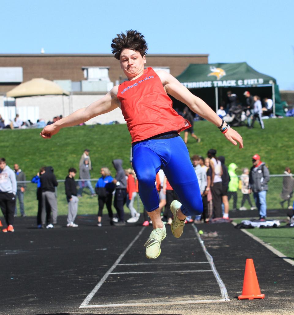 Licking Valley's Quinn Hornfeck competes in the long jump during Heath's Hank Smith Invitational on Saturday.