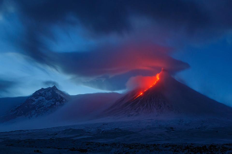 A volcano erupting.