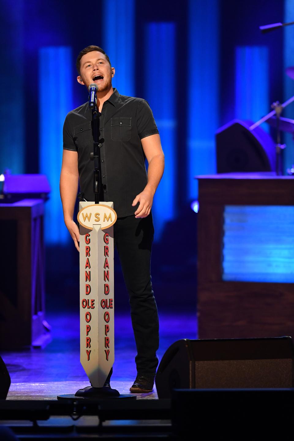 Scotty McCreery performing at the Grand Ole Opry in 2017