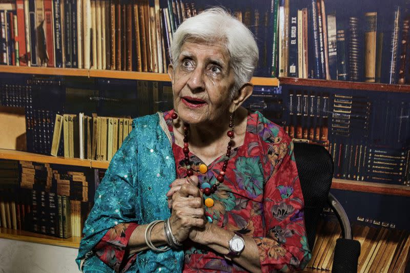 Reena Varma, 92-year-old Indian citizen born in Pakistan, who after 75 years came to visit her ancestral home and school, speaks during an interview with Reuters, in Lahore