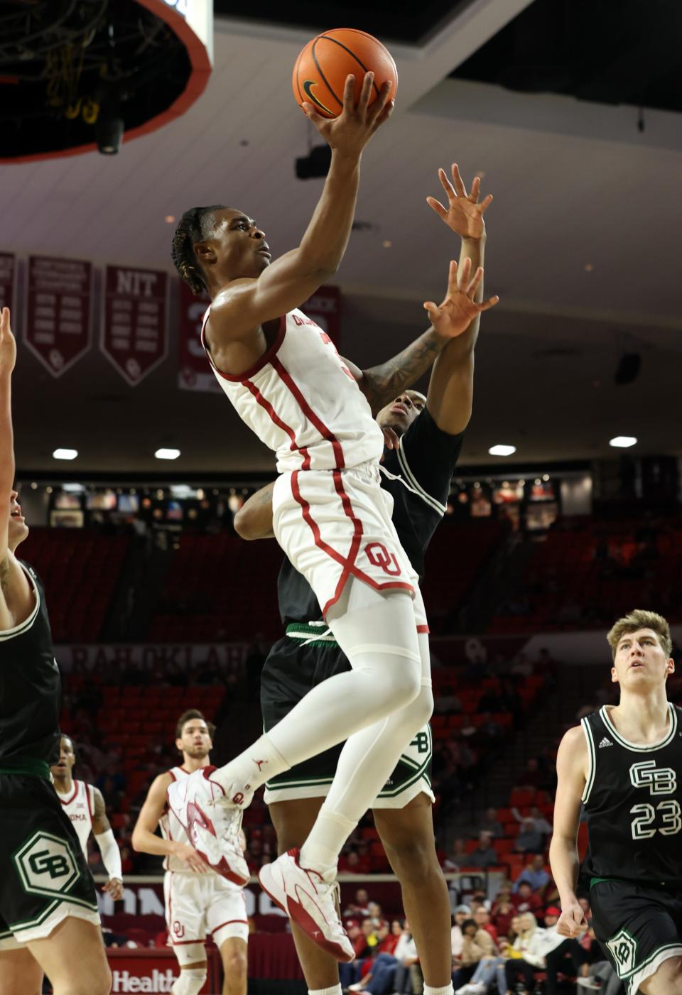 OU's Otega Oweh attempts a shot against Green Bay on Saturday at Lloyd Noble Center in Norman.