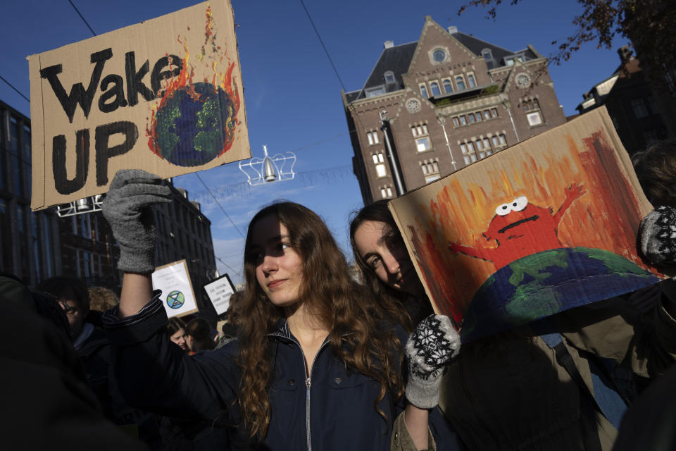 Thousands of people marched through Amsterdam, Netherlands, Sunday, Nov. 12, 2023, to call for more action to tackle climate change. Activist Greta Thunberg was among the speakers at the march that comes 10 days before national elections in the Netherlands. (AP Photo/Peter Dejong)