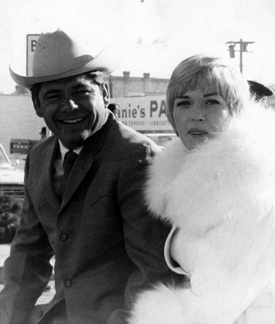 Sun Carnival Parade grand marshal Lee Trevino and his wife join the festivities Jan. 1, 1970.