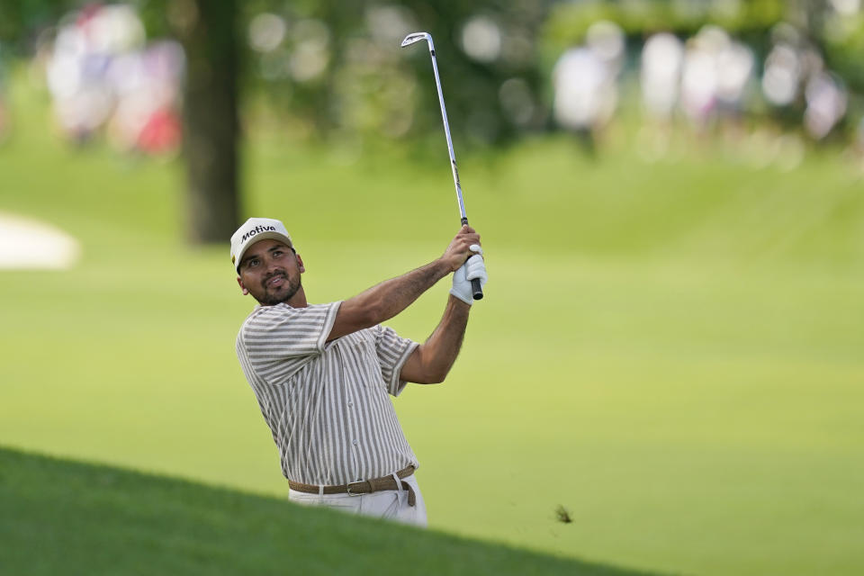 Jason Day, of Australia, hits from the rough on the 16th hole during the second round of the Wells Fargo Championship golf tournament at Quail Hollow on Friday, May 10, 2024, in Charlotte, N.C. (AP Photo/Erik Verduzco)