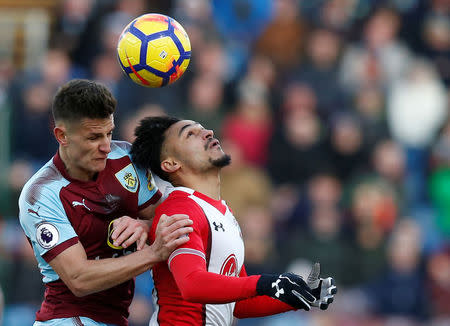 Soccer Football - Premier League - Burnley vs Southampton - Turf Moor, Burnley, Britain - February 24, 2018 Burnley's Ashley Westwood in action with Southampton's Sofiane Boufal REUTERS/Andrew Yates