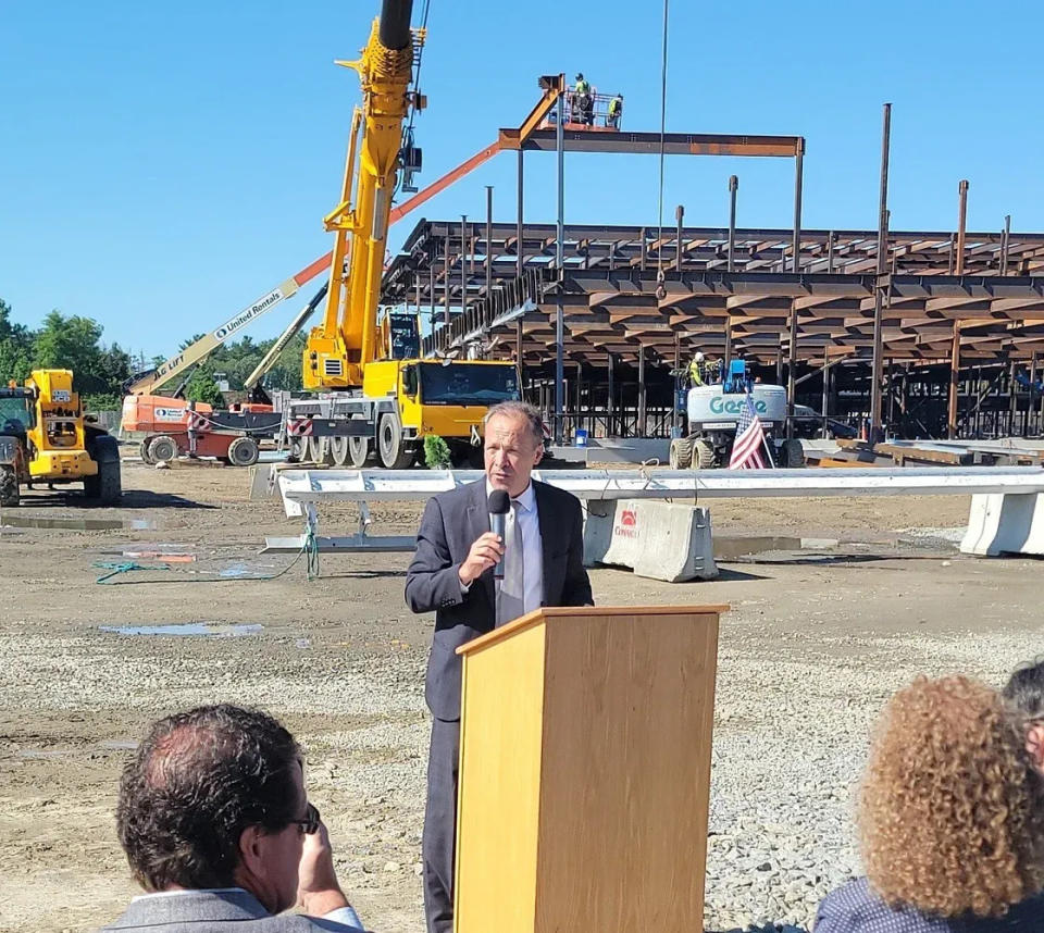 Superintendent-Director Alexandre Magalhaes addresses those in attendance at the topping-off ceremony for the new Bristol-Plymouth Regional Technical School in Taunton on Friday, May 31, 2024.