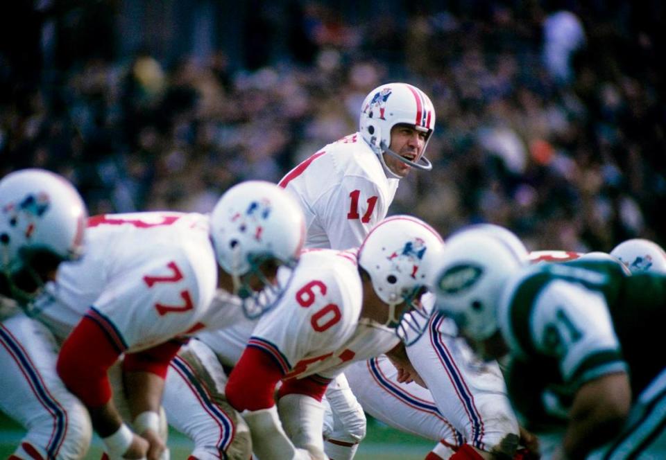Boston Patriots quarterback Joe Kapp (11) at the line of scrimmage against the New York Jets at Harvard Stadium on Nov. 22, 1970, in Boston, Massachusetts. Manny Rubio/USA TODAY Sports