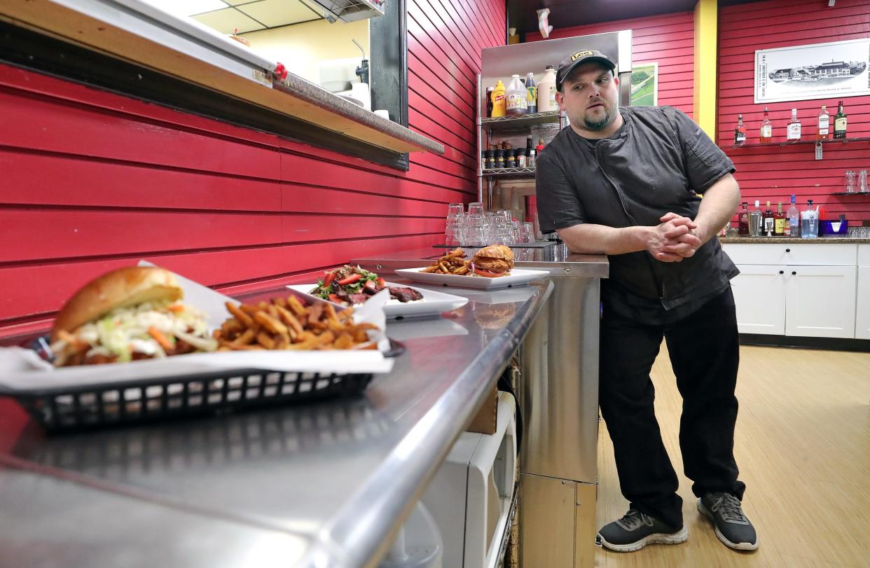 The Eye Opener chef John Kilmer goes over some of the new dinner offerings at the restaurant, Wednesday, April 24, 2024, in Akron, Ohio.