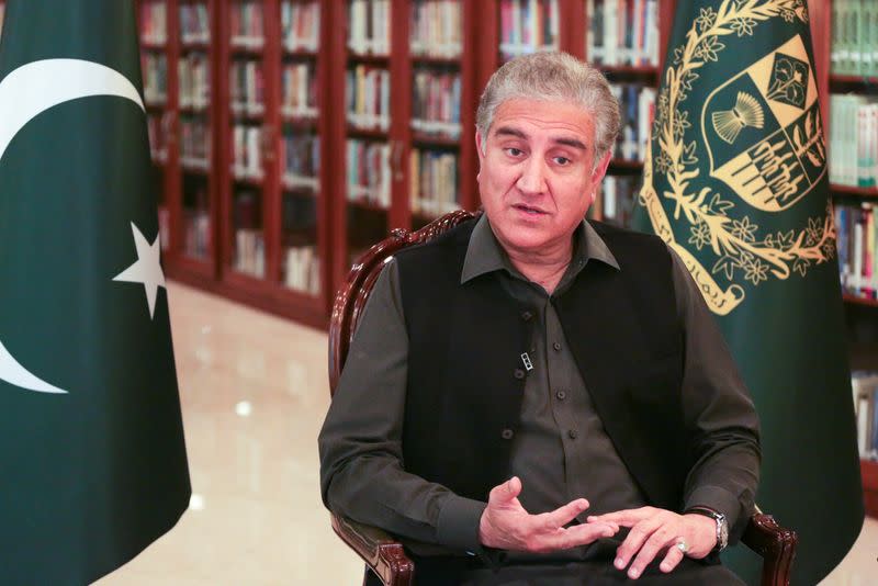 Pakistan's Foreign Minister Shah Mehmood Qureshi gestures as he speaks during an interview with Reuters at the Ministry of Foreign Affairs office in Islamabad,