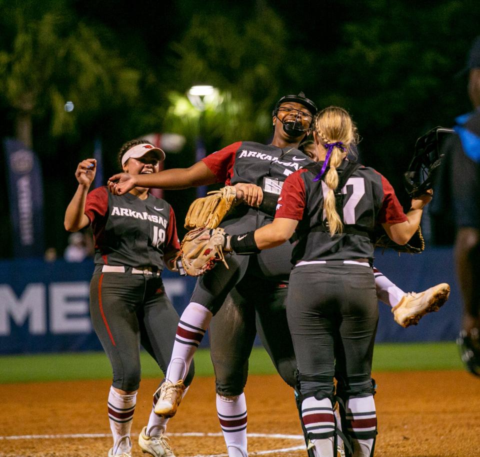 Arkansas celebrates its 4-1 win over Florida in the semifinals of the SEC Tournament, Friday, May 13, 2022, at Katie Seashole Pressly Stadium in Gainesville, Florida. The Razorbacks move on to the championship game. [Cyndi Chambers/ Special to the Sun] 2022