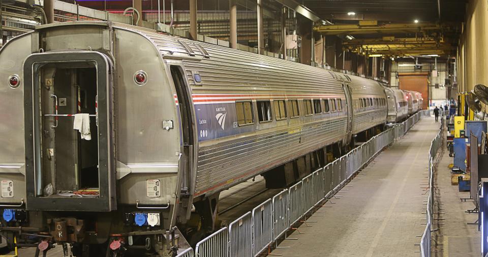 Amtrak passenger train cars wait for repairs at the company's maintenance facility in Bear on Monday Nov. 6, 2023.