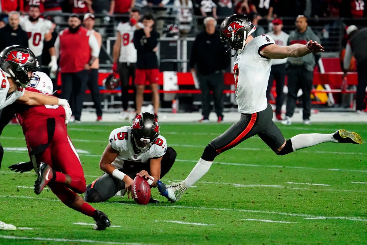 The Tampa Bay Buccaneers kept their playoffs chances alive with a come-from-behind Christmas victory against the Arizona Cardinals (Darryl Webb/AP) (AP)