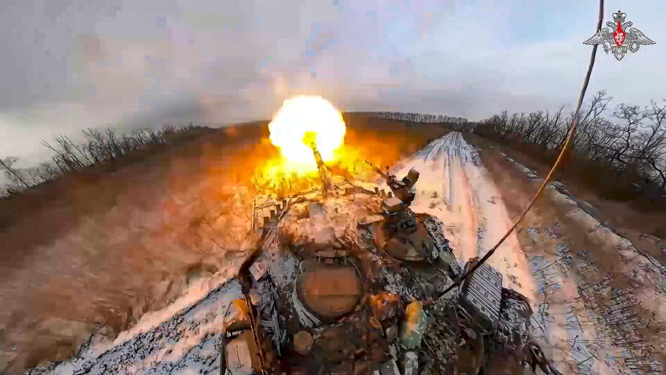 FILE - In this photo taken from video and released by the Russian Defense Ministry Press Service on Thursday, Feb. 8, 2024, a Russian tank fires in an undisclosed location in Ukraine. Russian President Vladimir Putin has focused his reelection campaign in the March 15-17 balloting on a pledge to fulfill his goals in Ukraine, describing the conflict as a battle against the West for Russia's very survival. (Russian Defense Ministry Press Service via AP, File)