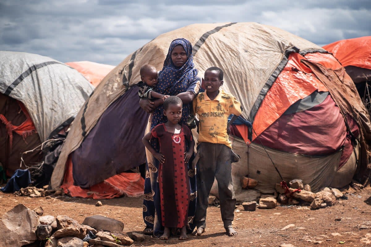 Sokorey* is pictured, having lived in a temporary camp with her three children for more than five months (Fredrik Lerneryd/Save the Children)