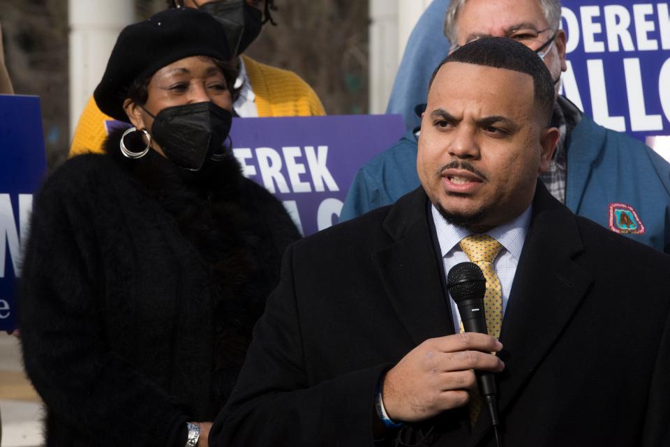 House 163 Rep. Derek Mallow talks to the crowd as he announces his campaign for the District 2 Senate seat, as House 165 Rep. Edna Jackson looks on in Forsyth Park on Monday.