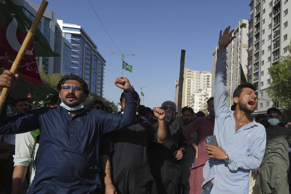 FILE - Supporters of Pakistan's former Prime Minister Imran Khan chant slogans during a protest against the arrest of their leader, in Karachi, Pakistan, Tuesday, May 9, 2023. The arrest of Khan earlier this week has shown how quickly his fervent loyalists can mobilize in large numbers. (AP Photo/Fareed Khan, File)