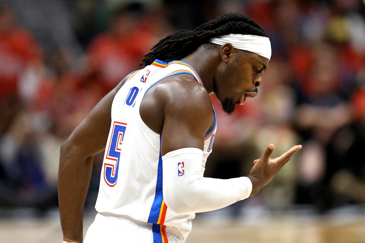 NEW ORLEANS, LOUISIANA - APRIL 27: Luguentz Dort #5 of the Oklahoma City Thunder reacts after scoring a three point basket during the second quarter in Game Three of the first round of the 2024 NBA Playoffs against the New Orleans Pelicans at Smoothie King Center on April 27, 2024 in New Orleans, Louisiana.