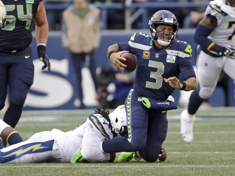 Do Russell Wilson and the Seahawks have enough left to escape the rough stretch of their schedule with a chance to reach the postseason? (AP)