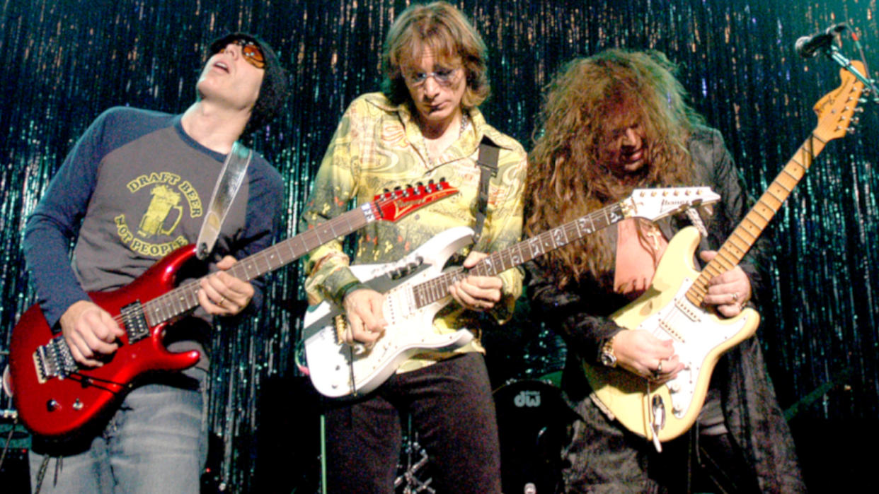  Joe Satriani, Steve Vai, and Yngvie Malmsteen perform, Chicago, Illinois, October 24, 2003.  