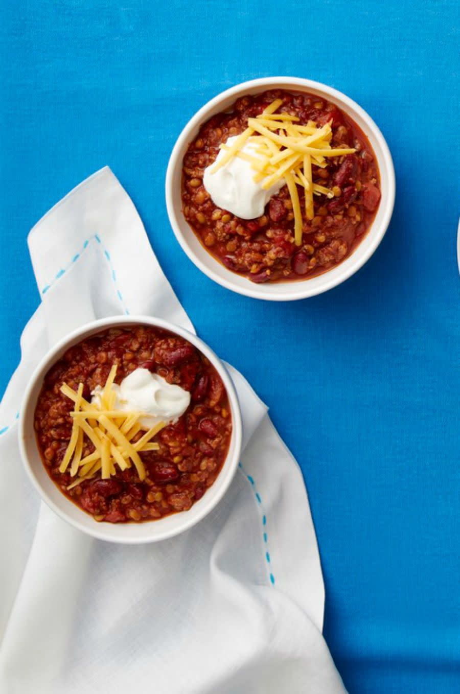 <p>A good chili doesn't have to take all day: This recipe takes just 20 minutes.</p><p><a rel="nofollow noopener" href="https://www.womansday.com/food-recipes/food-drinks/recipes/a53326/beef-and-lentil-chili/" target="_blank" data-ylk="slk:Get the recipe.;elm:context_link;itc:0;sec:content-canvas" class="link "><strong>Get the recipe.</strong></a> </p>